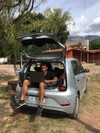 edouard working in the boot of a car